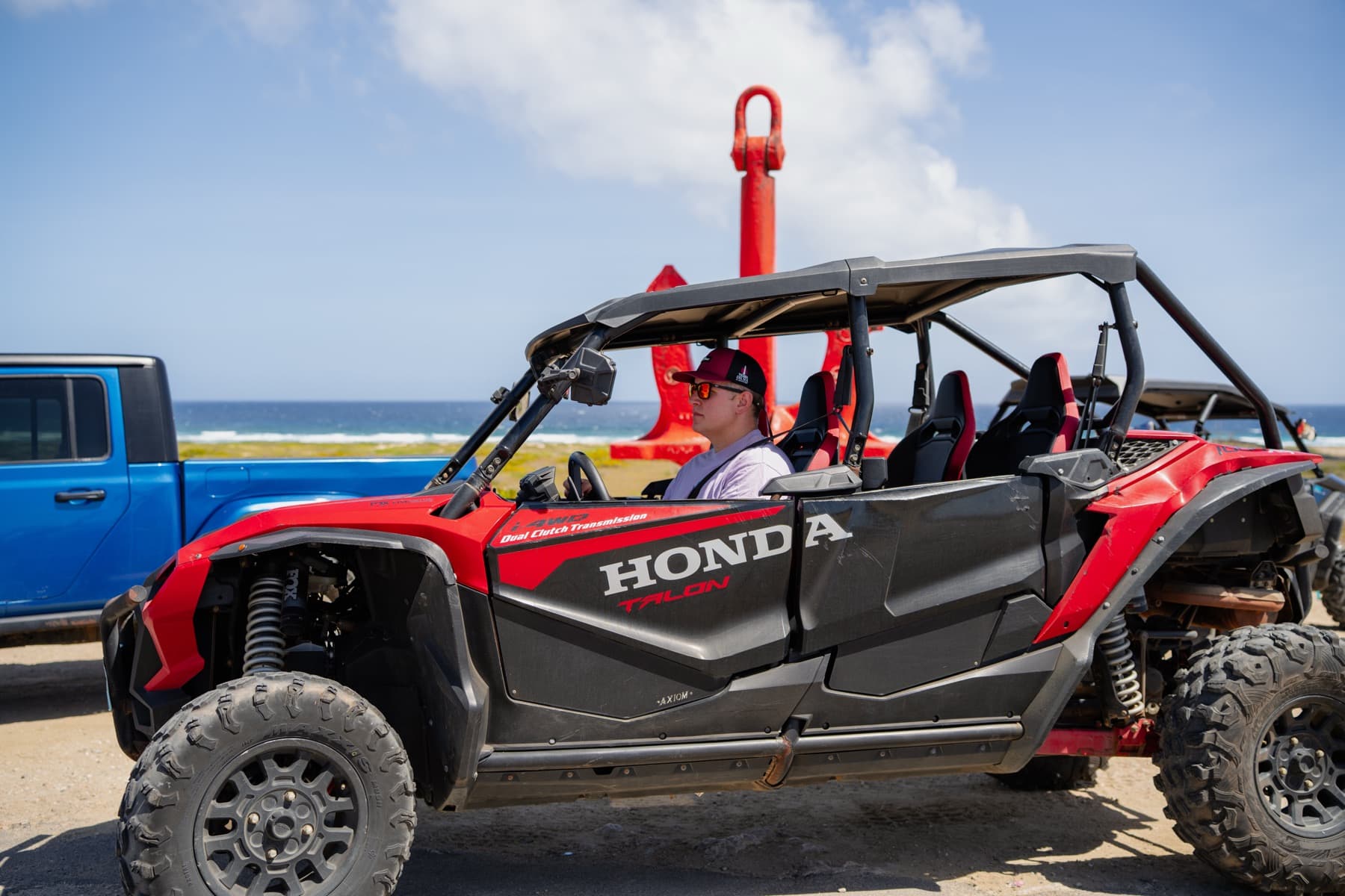 Guests aboard a 4-seat Honda UTV