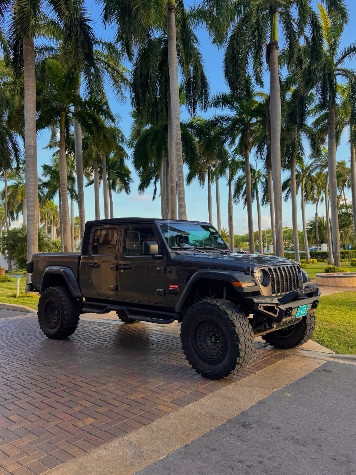 A Jeep Gladiator delivered under the palms at an Aruba hotel